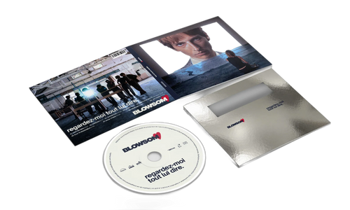 CD digipak ouvert, disque et fourreau argent à plat